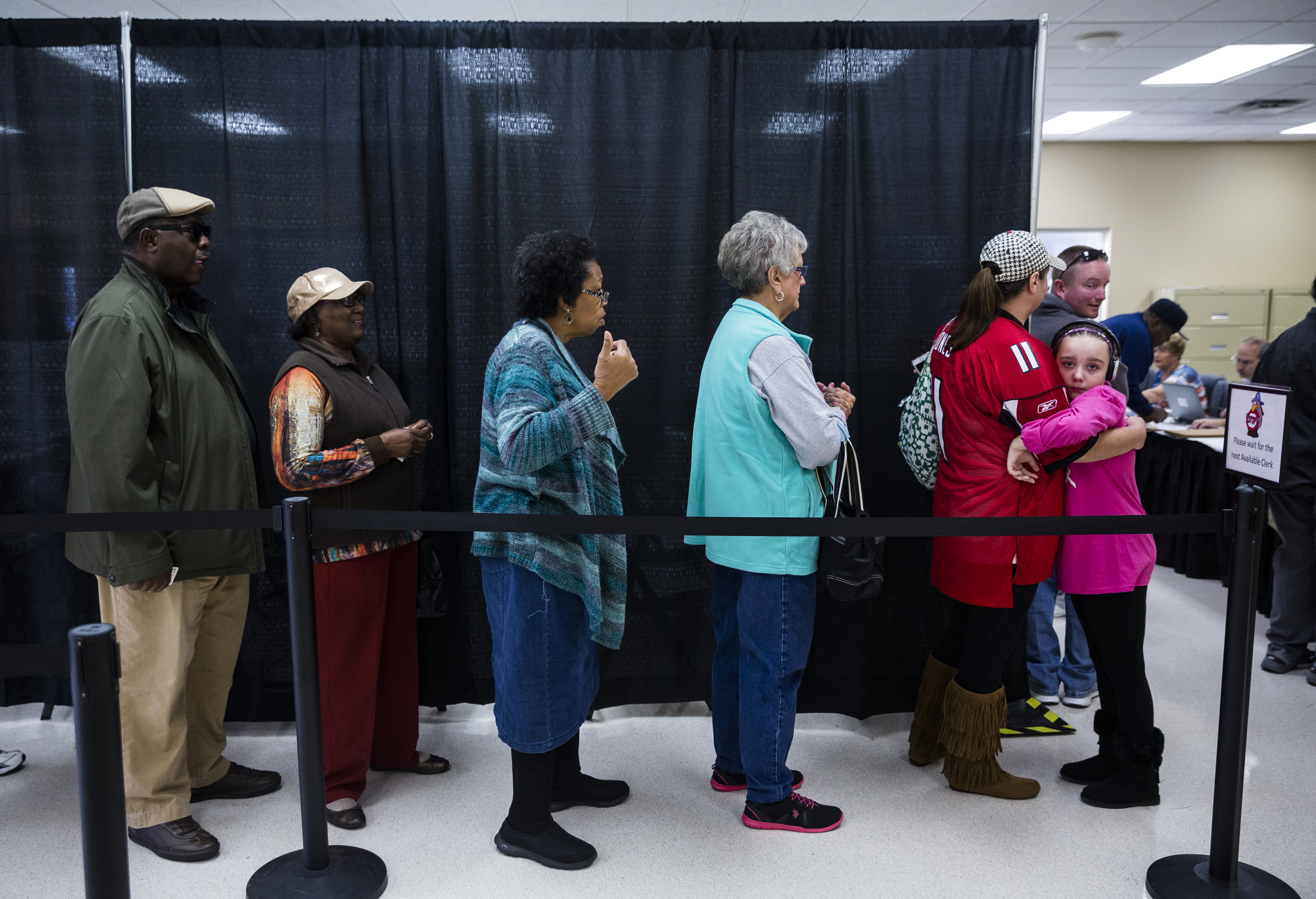 Staff photo by Doug Strickland / Voters wait in line to cast their ballots during early voting at the Hamilton County Election Commission on Amnicola Highway on Saturday, Oct. 22, 2016, in Chattanooga, Tenn.