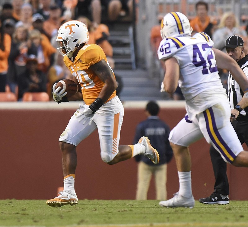 Tennessee's Cortez McDowell returns an interception during Saturday's 55-0 win against Tennessee Tech at Neyland Stadium in Knoxville.