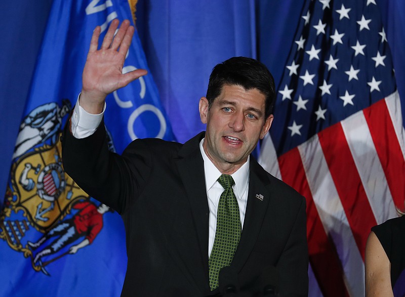 House Speaker Paul Ryan of Wis. waves to supporters at a campaign rally in Janesville, Wis., Tuesday, Nov. 8, 2016.