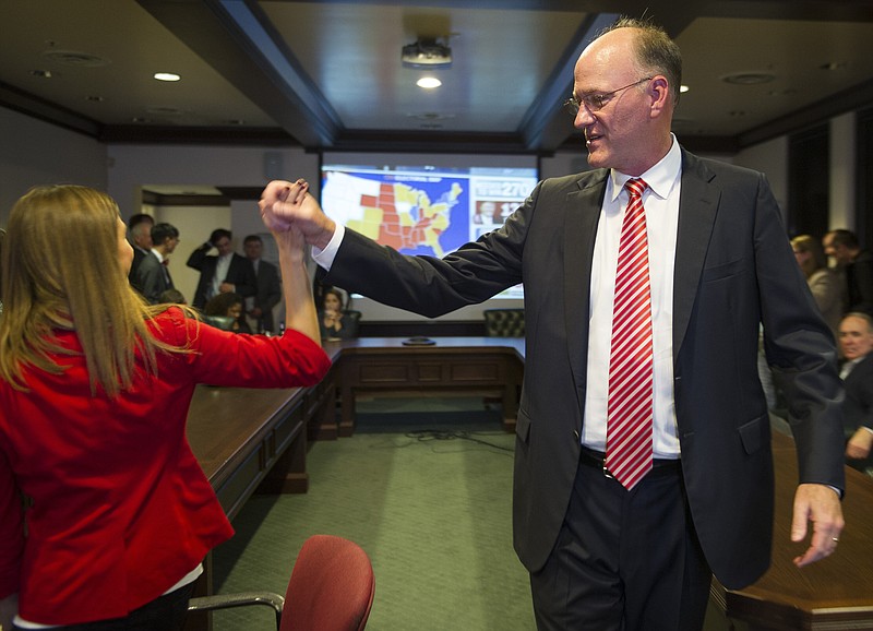 
              Tennessee state Sen. Steve Dickerson gets a high five from Rebecca Lofty after his win in the 2016 election at his campaign headquarters Tuesday, Nov. 8, 2016, in Nashville, Tenn. (George Walker IV/The Tennessean via AP)
            