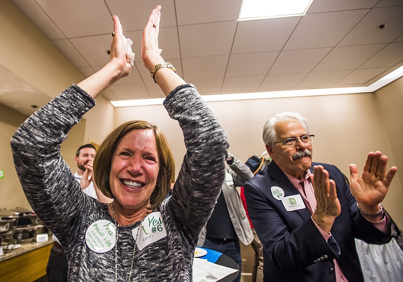 
              Carol Folsom cheers when Proposition 106, which would make assisted death legal among patients with a terminal illness who receive a prognosis of death within six months, is passed at the Westin Denver Downtown hotel on Tuesday, Nov. 8, 2016 in Denver, Colo. (Stacie Scott/The Gazette via AP)
            