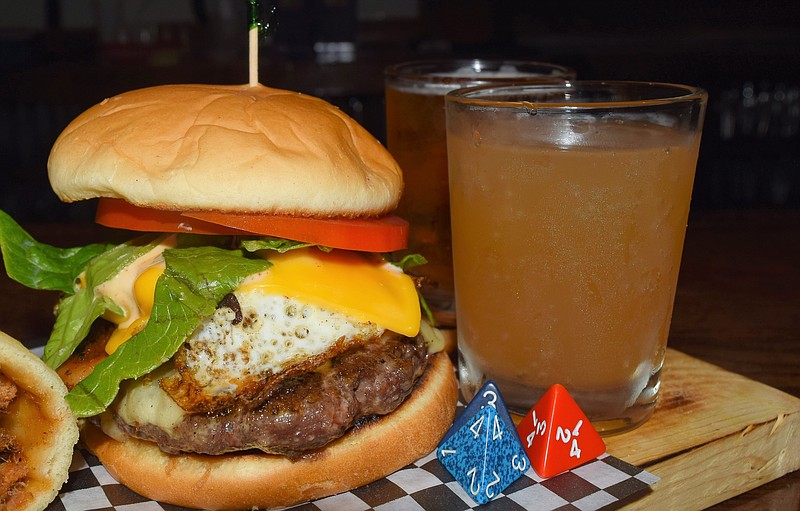 Toss the dice to find out what will top your burger at Sneak E Squirrel. It might be an elk burger with a fried egg, bacon, Swiss and American cheeses, aioli, lettuce and tomato and served with flights of IPC or nonalcoholic Butter Beer. Flights are small glasses featuring a number of beers.