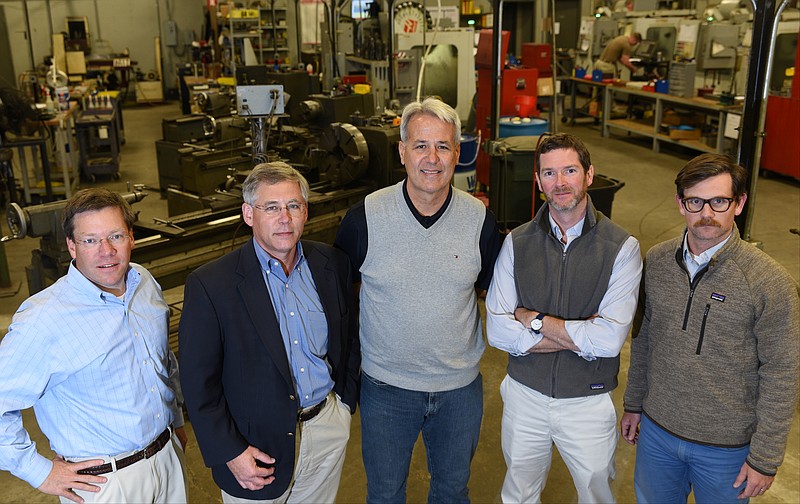 Chris Rowe, managing director, Andy Stockett, managing director, Lou Ziebold, president/owner, Ben Brown, partner and Jay Hildebrand, partner, from left, stand Tuesday, Nov. 8, 2016 in the shop at Southeastern Tool & Design.