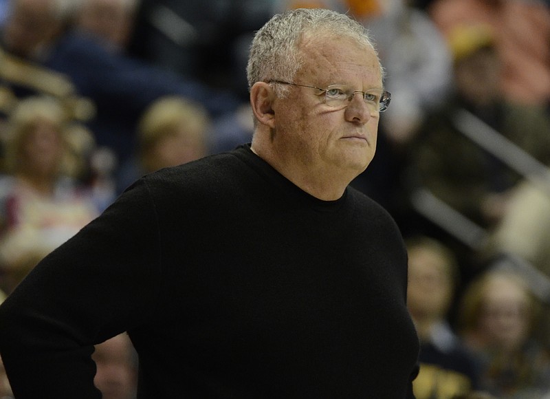 UTC's head coach Jim Foster watches from the sidelines during a women's basketball game between UTC and UTK at McKenzie Arena in Chattanooga, Tenn., on Wednesday, November 26, 2014.