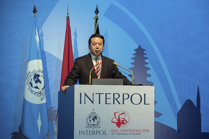 
              In this photo released by Xinhua News Agency, China's Vice Minister of Public Security Meng Hongwei delivers a campaign speech at the 85th session of the general assembly of the International Criminal Police Organization (Interpol), in Bali, Indonesia, Nov. 10, 2016. The top Chinese police official was elected president of Interpol on Thursday, setting off alarm bells among rights advocates over the legitimization of abuses and lack of transparency within China's legal system. (Du Yu/Xinhua via AP)
            