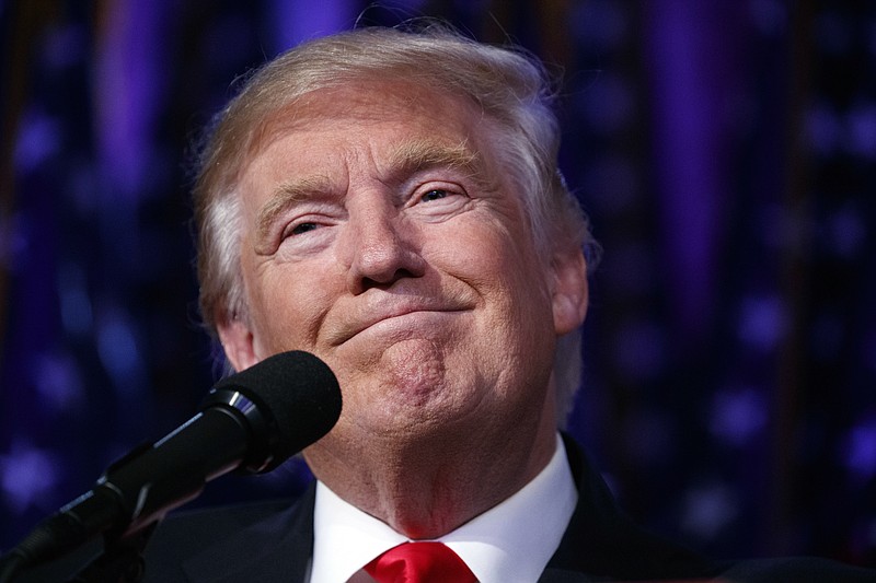 President-elect Donald Trump smiles as he arrives to speak at an election night rally, Wednesday, Nov. 9, 2016, in New York. (AP Photo/ Evan Vucci)