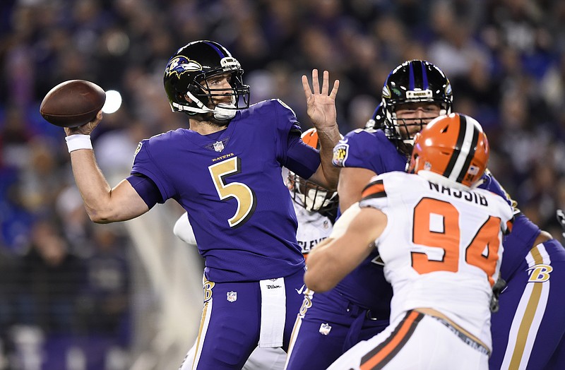 Ravens rout Browns in Cleveland to take over first place in AFC North