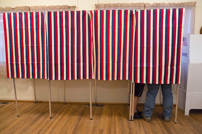 
              In this Nov. 8, 2016, photo, a voter fills out his ballot at the Wilson School House in unincorporated Wilson, Idaho. Donald Trump’s victory came as a surprise to many Americans, the nation’s pollsters most of all. Heading into Election Day, most national surveys overstated what will likely be a narrow popular vote advantage for Hillary Clinton and led many to believe she was a shoo-in to win the Electoral College. (AP Photo/Otto Kitsinger)
            