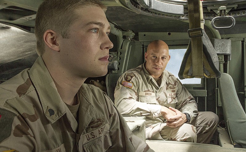 This image released by Sony Pictures shows Joe Alwyn, left, and Vin Diesel in a scene from the film, "Billy Lynn's Long Halftime Walk," in theaters on November 11.