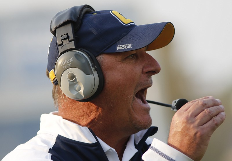 UTC head football coach Russ Huesman shouts to call a timeout during the Mocs' home football game against the Wofford Terriers at Finely Stadium on Saturday, Nov. 12, 2016, in Chattanooga, Tenn.