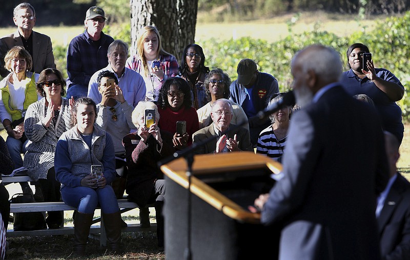 
              In this Thursday, Nov. 10, 2016 photo, James Meredith speaks during an unveiling ceremony for a marker for the spot where he was shot in Hernando, Miss., during the March Against Fear from Memphis, Tenn., to Jackson, Miss., in 1966. The pioneer who integrated the University of Mississippi in 1962 said, "Mississippi is the center of the black-white, rich-poor universe. ... If Mississippi can't come up with the solution to the problem of the day, it can't be done. I'm very confident it's going to get done." (Stan Carroll/The Commercial Appeal via AP)
            