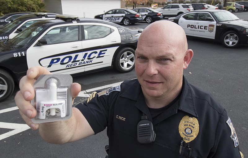 Staff Photo by Dan Henry / The Chattanooga Times Free Press- 11/8/16. Sgt. Chris Rice stands behind the Red Bank Police Department on November 8, 2016 and speaks about his experience using Narcan nasal spray to save a man from a drug overdose on October 27 of this year. Sgt. Rice was the first officer from the department to use the spray which is now standard issue for Red Bank Police Officers. 