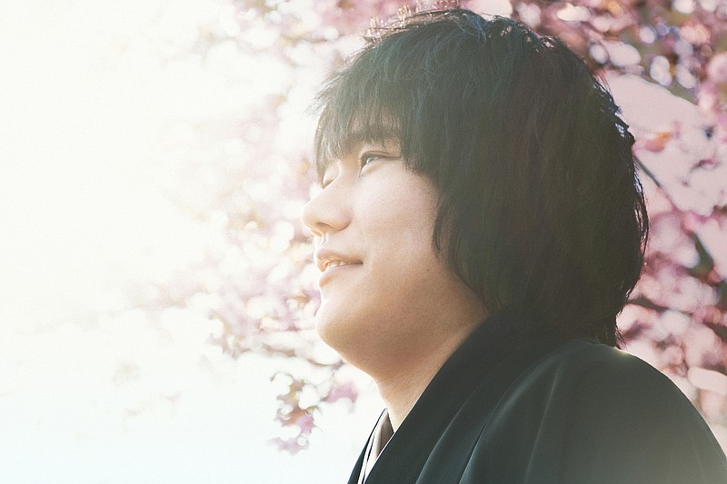 
              This image released by "Satoshi no Seishun" Film Partners shows Kenichi Matsuyama, portraying shogi master Satoshi Murayama, in a scene from the film, "Satoshi: A Move for Tomorrow." The devotion Matsuyama gave to portraying a shogi prodigy who lived a fearlessly single-minded life is clear in the months he spent practicing placing the pawns in the Japanese board game, immersing himself in the master’s selfless view on death and gorging to gain weight. ("Satoshi no Seishun" Film Partners via AP)
            