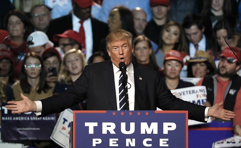 
              FILE - In this Tuesday, Nov. 8, 2016 file photo, Republican presidential candidate Donald Trump speaks at a campaign rally in Grand Rapids, Mich. In a new book, Megyn Kelly says Trump tried unsuccessfully to give her a free hotel stay as part of what she called his pattern of trying to influence news coverage of his presidential campaign. In "Settle for More," to be released Tuesday, Nov. 15, 2016, Kelly also said Trump may have gotten a pre-debate tip about her first question, in which she confronted him with his critical comments about women. (AP Photo/Paul Sancya, File)
            