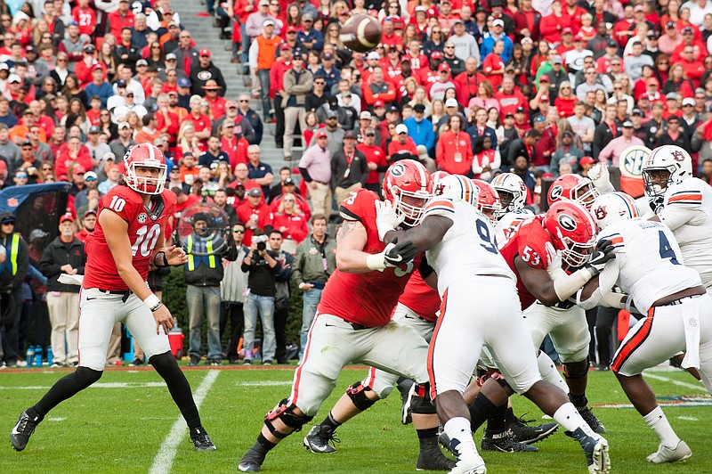 Georgia freshman quarterback Jacob Eason completed 20 of 31 passes for 208 yards in Saturday's 13-7 defeat of Auburn.