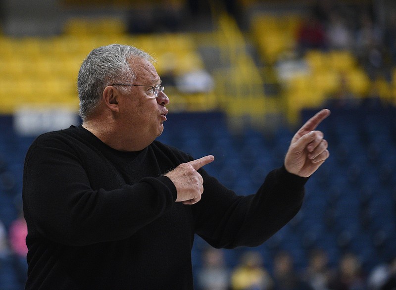 UTC coach Jim Foster yells direction during the game against Florida Monday, Nov. 14, 2016 at McKenzie Arena.