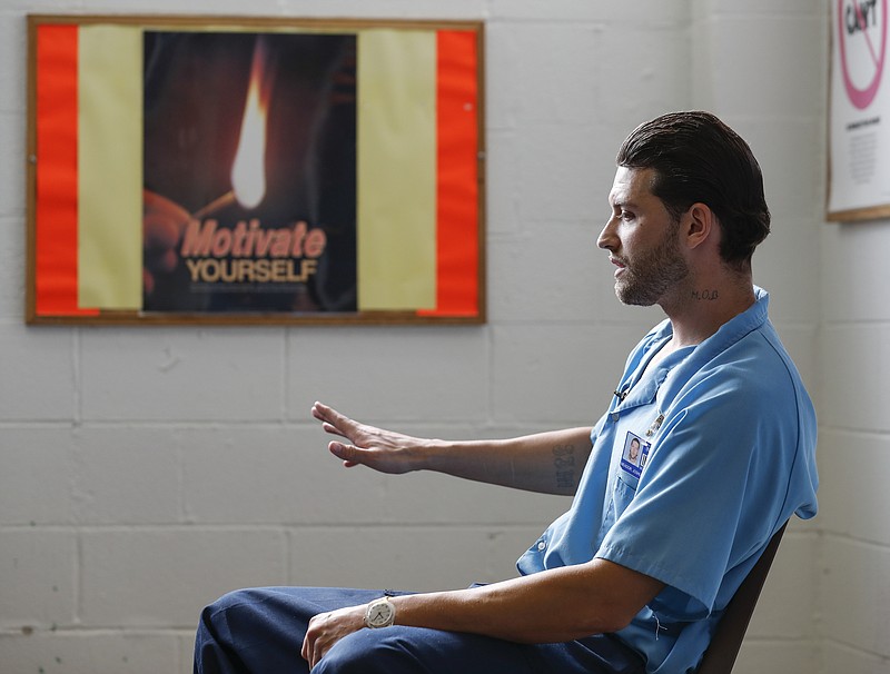 
              In this Oct. 17, 2016 photo, inmate Joshua Meador speaks about addiction at Sheridan Correctional Center in Sheridan, Ill. Meador, a recovering heroin addict, hopes to get into a Vivitrol program at Sheridan before his release in January. U.S. prisons are experimenting with the high-priced monthly injection that could help addicted inmates stay off opioids after they are released. (AP Photo/Kamil Krzaczynski)
            