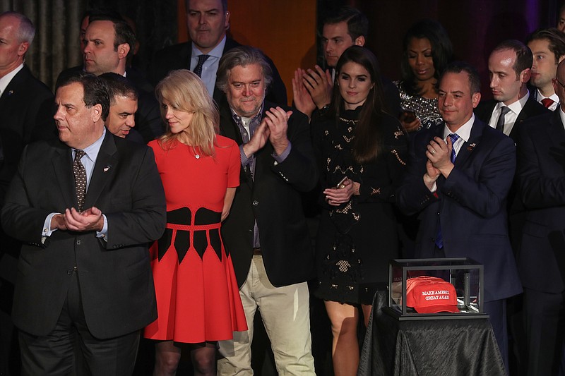 Stephen Bannon, fourth from left, and Reince Priebus, second from right, during Donald Trump's victory speech in New York, on Nov. 9.