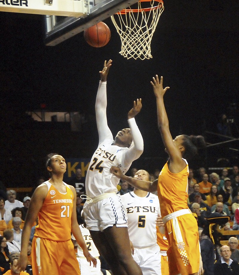East Tennessee State's Anajae Stephney (24) shoots in front of Tennessee's Diamond DeShields, right, during an NCAA college basketball game, Tuesday, Nov. 15, 2016 in Johnson City, Tenn.