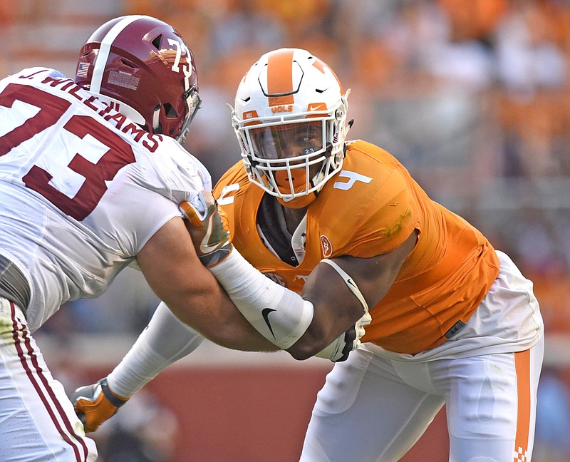 Tennessee's LaTroy Lewis tries to shed the block of Alabama's Jonah Williams during last month's game in Knoxville. Lewis is one of four fifth-year Vols who will take part in senior day Saturday at Neyland Stadium.