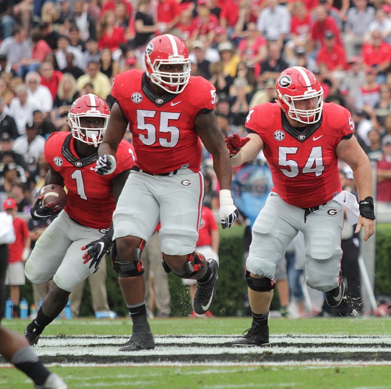 Georgia right guard Dyshon Sims (55) has split time this season with Lamont Gaillard, but Sims played left guard last week against Auburn after starter Isaiah Wynn suffered a knee injury.