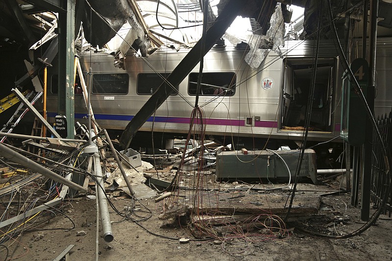 
              FILE – This Oct. 1, 2016, file photo provided by the National Transportation Safety Board shows damage from a Sept. 29, 2016, commuter train crash that killed a woman and injured more than 100 people at the Hoboken Terminal in Hoboken, N.J. Thomas Gallagher, the engineer of the commuter train that slammed into the station going double the 10 mph speed limit, suffered from sleep apnea that had gone undiagnosed, two U.S. officials told The Associated Press on Wednesday, Nov. 16, 2016. (Chris O'Neil/National Transportation Safety Board via AP, File)
            