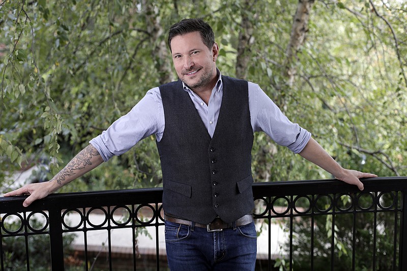 
              In this Oct. 31, 2016 photo, Ty Herndon poses in Nashville, Tenn., to promote his latest album, “House on Fire,” released on Friday. (AP Photo/Mark Humphrey)
            