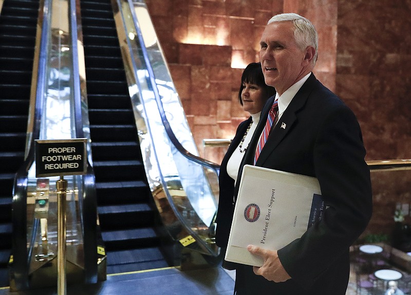 Vice President-elect Mike Pence and his wife Karen arrives at Trump Tower, Tuesday, Nov. 15, 2016, in New York. 