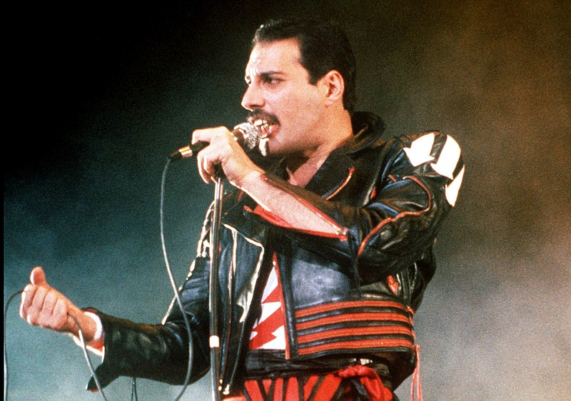 In this 1985 file photo, singer Freddie Mercury of the rock group Queen performs at a concert in Sydney, Australia.