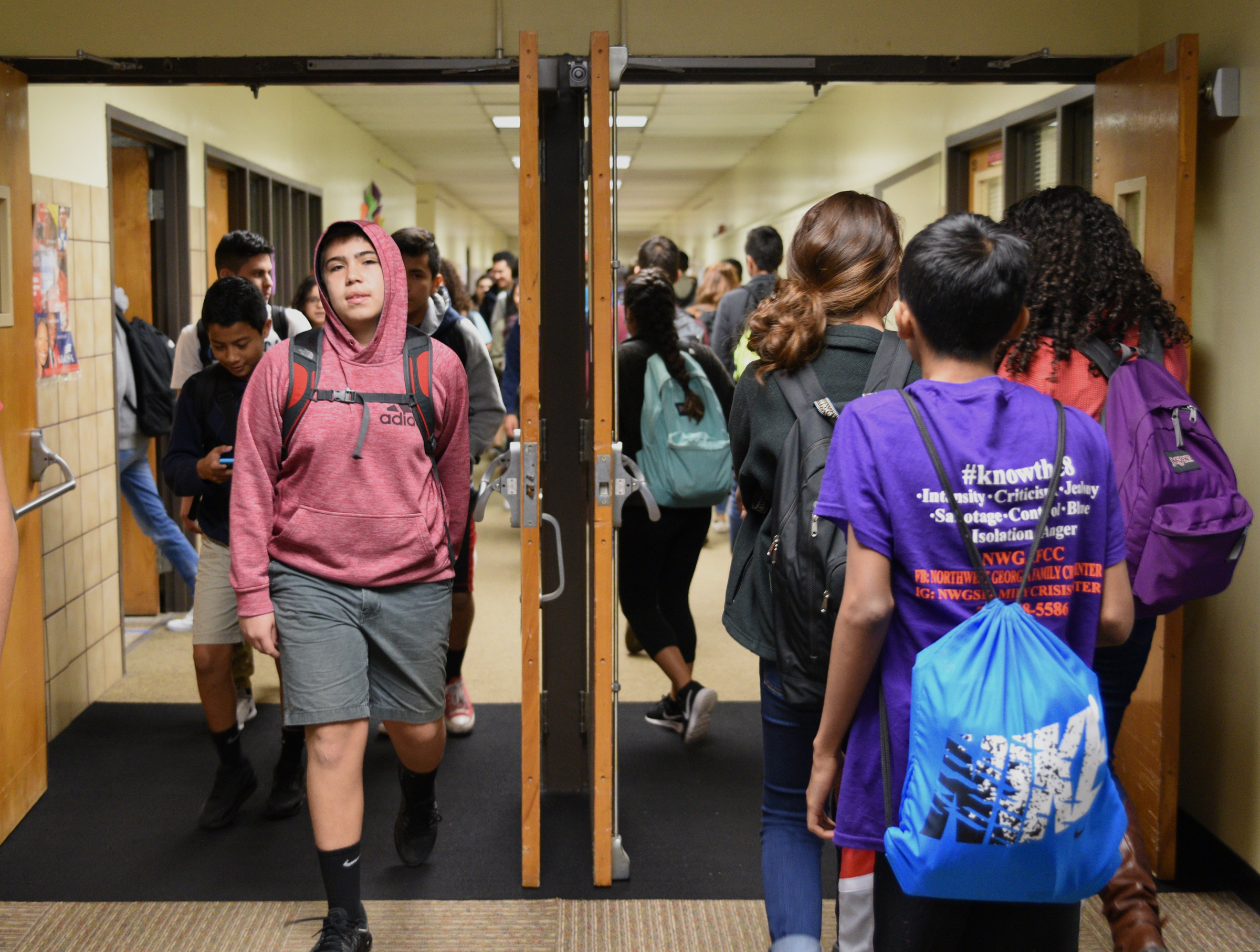 Students fill the hall between classes Wednesday, Nov. 16, 2016 at Dalton High School.