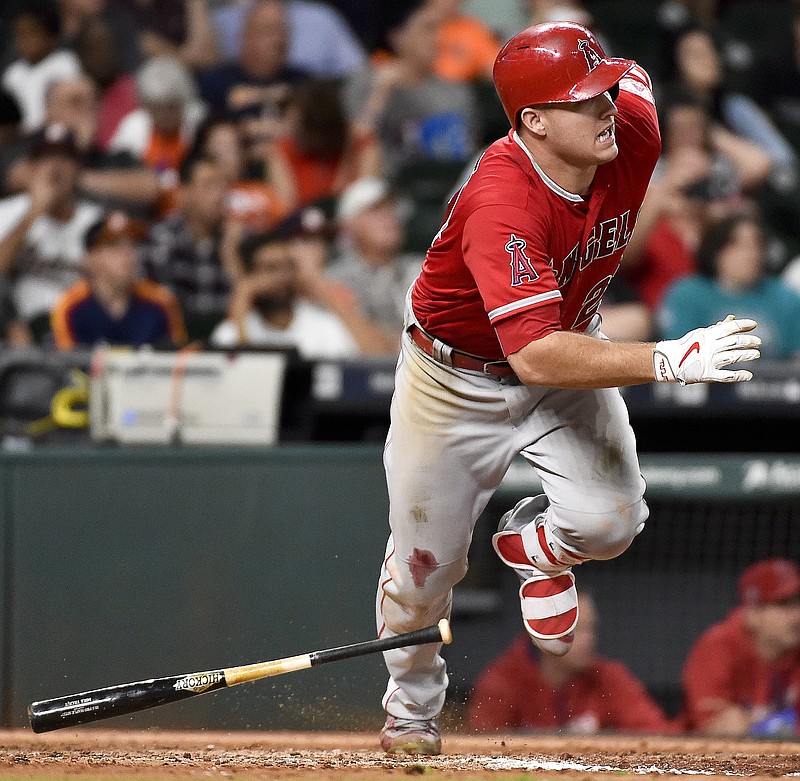 
              FILE - In this Sept. 24, 2016, file photo, Los Angeles Angels' Mike Trout watches his RBI-single in the eighth inning of a baseball game against the Houston Astros, in Houston. Trout, Mookie Betts and Jose Altuve are the finalists for the American League Most Valuable Player award. (AP Photo/Eric Christian Smith, File)
            