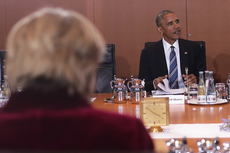 
              German Chancellor Angela Merkel, left, and U.S. President Barack Obama, right, attend a bilateral meeting at the chancellery in Berlin, Thursday, Nov. 17, 2016. Germany is the last European stop of Obama's final tour abroad as U.S. president. (AP Photo/Markus Schreiber, Pool).
            