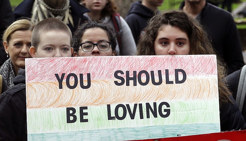 Protesters gather before marching through the streets in Portland, Ore., Wednesday, Nov. 16, 2016. Approximately 100 students at Portland State University joined a nationwide campus walkout to protest President-elect Donald Trump. (AP Photo/Don Ryan)