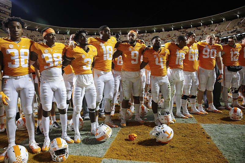 Tennessee players gather for the Tennessee Waltz after the Vols' home football game against the Missouri Tigers at Neyland Stadium on Saturday, Nov. 19, 2016, in Chattanooga, Tenn. Tennessee won their final home game of the season 63-37.
