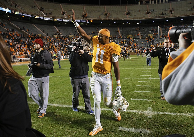 Tennessee senior quarterback Joshua Dobbs leaves the field after his last game at Neyland Stadium against the Missouri Tigers on Saturday, Nov. 19, 2016, in Chattanooga, Tenn. Tennessee won their final home game of the season 63-37.