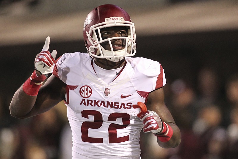 Arkansas running back Rawleigh Williams III celebrates his touchdown against Mississippi State during their NCAA football game in Starkville, Miss., Saturday, Nov. 19, 2016. (James Pugh/The Laurel Chronicle via AP)

