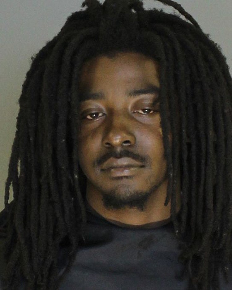 
              This undated photo provided by Sumter County Sheriff's Office shows Dontrell Montese Carter. A fugitive accused of attempting to murder police officers fatally shot a deputy U.S. marshal trying to arrest him Friday, Nov. 18, 2016, in southeast Georgia, where other law officers returned fire and killed the suspect, federal authorities said. The slain suspect was identified as Dontrell Montese Carter, who was wanted in Sumter County, S.C., since September on charges of attempted murder of police officers, domestic violence and illegally discharging a weapon, the Marshals Service said in a news release. (Sumter County Sheriff's Office via AP)
            