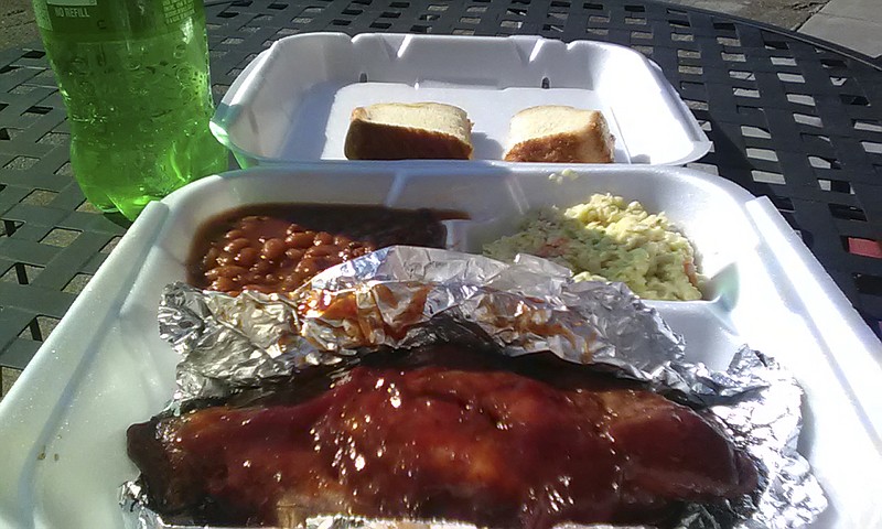 A turkey rib plate at G's Detroit Sausages on M.L. King Boulevard includes barbecue glazed turkey ribs with coleslaw, baked beans and white bread.