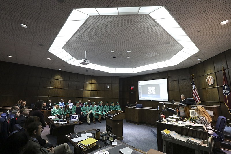 Staff Photo by Dan Henry / The Chattanooga Times Free Press- 11/21/16. Judge Tom Greenholtz begins the fall drug court graduation in his courtroom in Hamilton County on Monday, November 21, 2016. While law enforcement officials first thought they could open the program in North Georgia in summer 2018, they are now slated to begin operations this fall, Lookout Mountain Judicial Circuit Superior Court Judge Don Thompson said. 