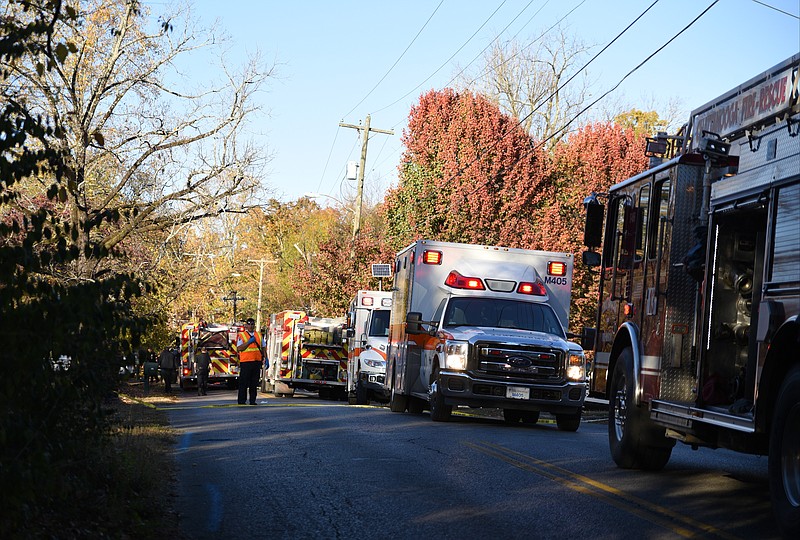 Emergency personnel work at the scene of a school bus wreck involving multiple fatalities on Talley Road in Chattanooga, Tenn., Monday, Nov. 21, 2016. The crash occurred around 3:20 p.m.
