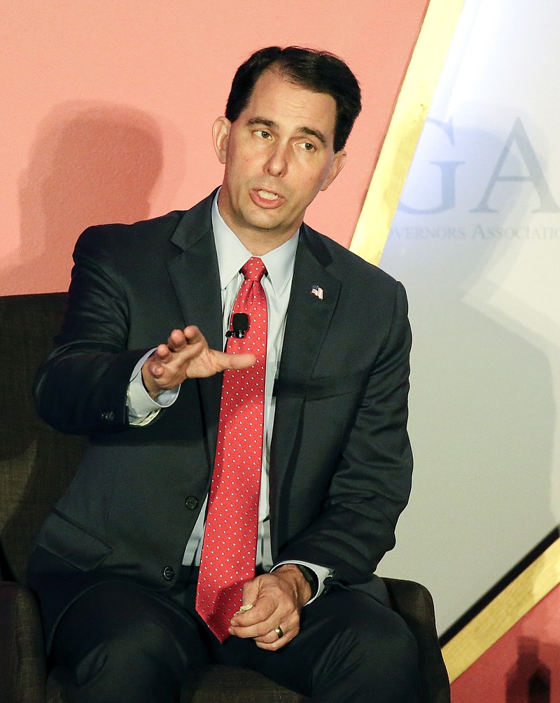 
              Wisconsin Gov. Scott Walker speaks during a plenary session at the Republican Governors Association annual conference, Tuesday, Nov. 15, 2016, in Orlando, Fla. (AP Photo/John Raoux)
            