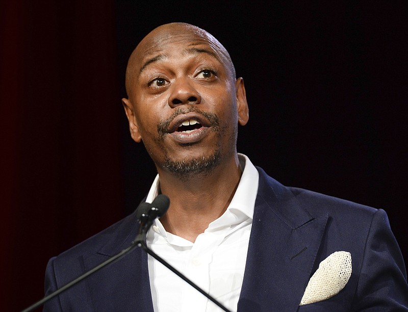 
              FILE - In this July 18, 2015 file photo, comedian Dave Chappelle speaks at the RUSH Philanthropic Arts Foundation's Art for Life Benefit in New York. Chappelle is headed back to TV with his first concert specials in a dozen years. A trio of specials will be released on Netflix simultaneously in 2017. (Photo by Scott Roth/Invision/AP, File)
            