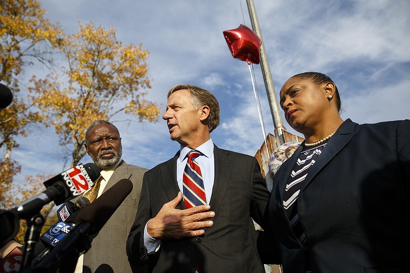 Hamilton County Interim School Superintendent Dr. Kirk Kelly, Tennessee Gov. Bill Haslam, and Woodmore Principal Brenda Adamson-Cothran, from left, speak at a news conference at Woodmore Elementary School on Wednesday, Nov. 23, 2016, in Chattanooga. Gov. Haslam visited the school following Monday's school bus crash that killed five children and injured dozens more.