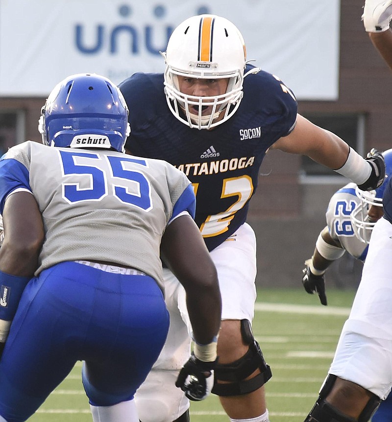 UTC right guard Josh Cardiello (72) prepares to block Shorter's Justin Filmore (55).  The University of Tennessee/Chattanooga Mocs hosted the Shorter University Hawks in NCAA football action on Sept. 1, 2016. 