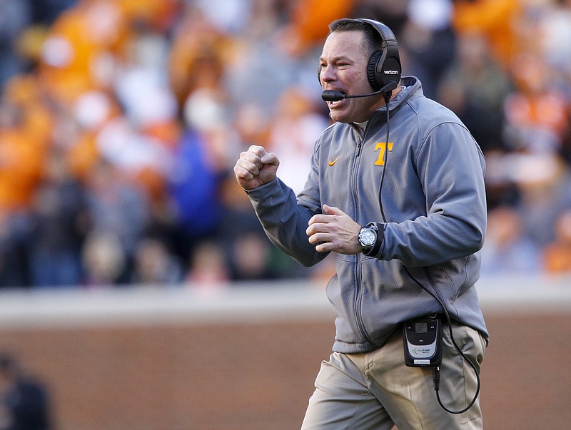 Tennessee football coach Butch Jones shouts to players during the Vols' home football game against the Missouri Tigers at Neyland Stadium on Saturday, Nov. 19, 2016, in Chattanooga, Tenn. Tennessee won their final home game of the season 63-37.