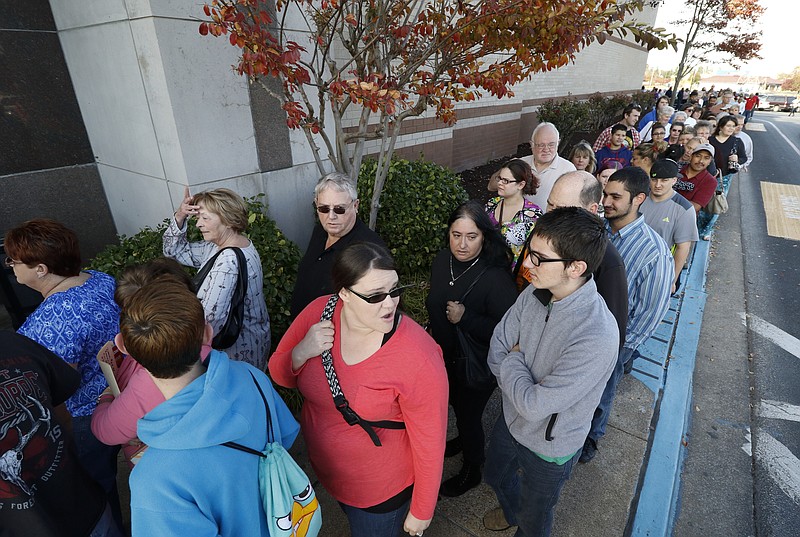 Shoppers form a massive line waiting for JC Penny to open at 3pm on Thanksgiving day as the Black Friday shopping deals begin early again this year.