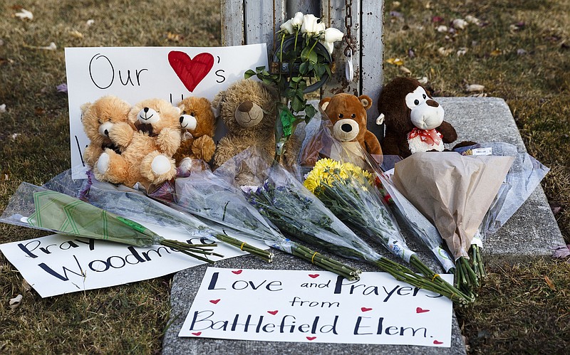 A makeshift memorial at Woodmore Elementary School is seen on Wednesday, Nov. 23, 2016, in Chattanooga, Tenn. Students at the school were victims in Monday's school bus crash that killed 6 children and injured dozens more.