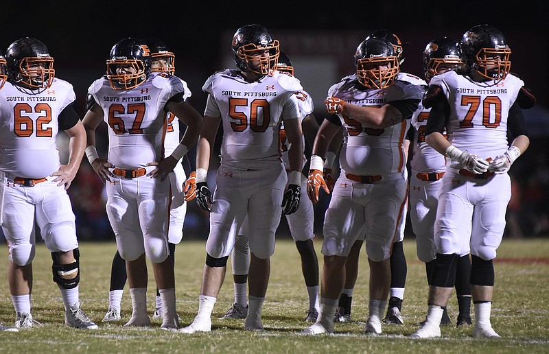 The Pirate offensive line awaits the play, from left Mitch Butner (62), Hayden Branham (67), Corbin Cawood (50), Drew Daniels (55), and Franklin Russell (70).  The South Pittsburg Pirates visited the Whitwell Tigers in TSSAA football action on October 7, 2016