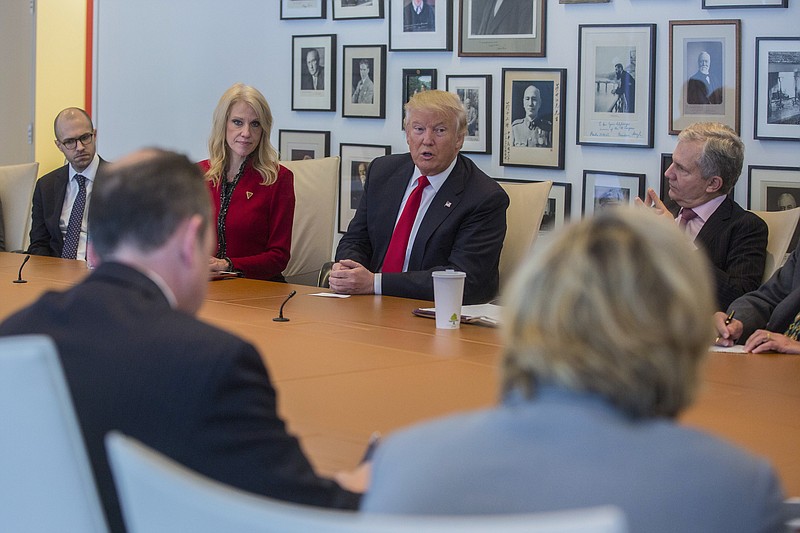 President-elect Donald Trump and aide Kellyanne Conway, left, meet with Arthur Sulzberger Jr., second from right, publisher of the New York Times, and reporters, columnists and company leadership Tuesday. (Hiroko Masuike/The New York Times)