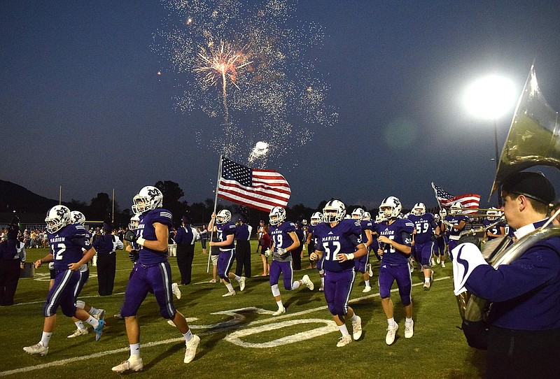 The Marion County Warriors take the field under their traditional shower of fireworks.  The Boyd-Buchanan Buccaneers visited the Marion County Warriors in TSSAA football action on September 23, 2016. 